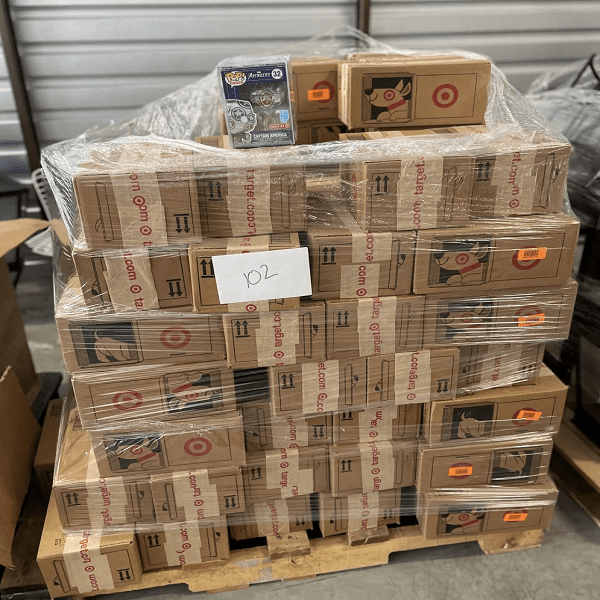 Assorted Funko Pop pallet featuring boxed collectible vinyl figures stacked in bulk for retail, resale, and collector inventory display.