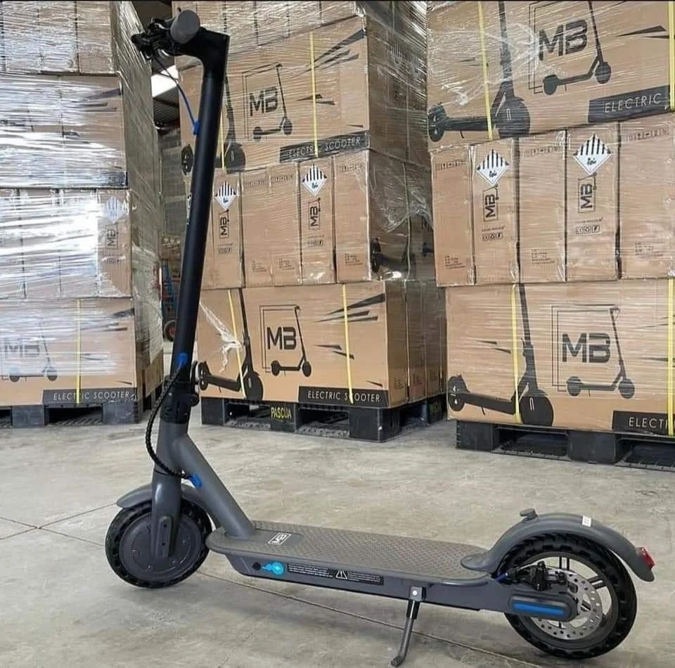 Electric scooter pallets liquidation featuring bulk wholesale electric scooters stacked on pallets ready for resale at discounted prices.