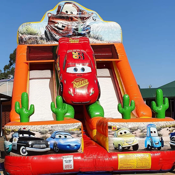 Assorted jumping castles and water slides on liquidation pallet, ideal for rental businesses, events, and resale opportunities.